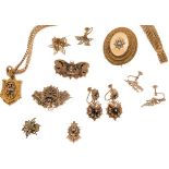 A Victorian demi-parurecomprising a brooch and pair of earrings, the brooch modelled as a winged