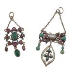 Two enamel and multi-gem set pendantseach of pierced scrolling design, set with verious garnets,