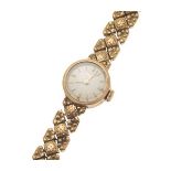LONGINES - A ladies 18ct gold wrist watchthe small champagne dial signed, gilt baton indicators,