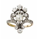 A pearl and diamond set ringthe central bouton pearl set in a scrolling surround of graduated old