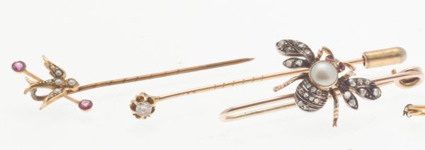 A group of diamond and multi gem set tie pins and broochesto include a gold pin bar brooch with - Image 2 of 3