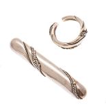 GEORG JENSEN - A silver brooch and similar ringa silver ring, split, rounded section, applied beaded