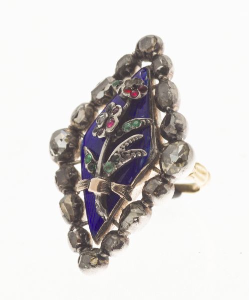 A 19th century multi gem set ringof navette outline, the blue enamel ground with onset ruby and