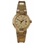 BAUME & MERCIER - A ladies 18ct gold wrist watchthe circular champagne dial with baton numerals,