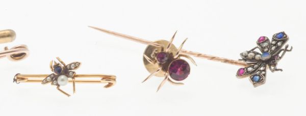 A group of diamond and multi gem set tie pins and broochesto include a gold pin bar brooch with - Image 3 of 3
