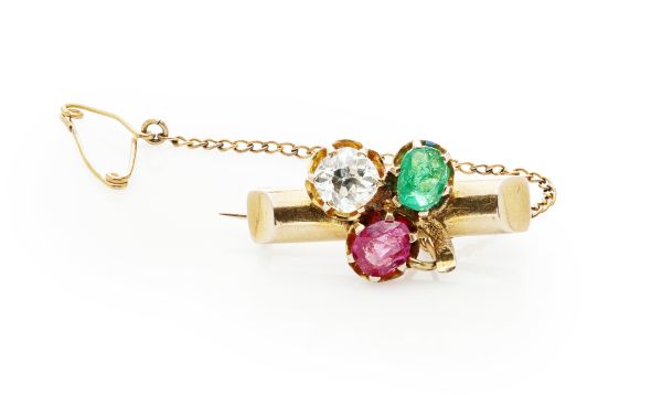 A diamond, emerald and ruby set broochthe yellow metal bar with applied shamrock motif, each leaf