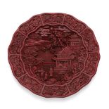 CARVED CINNABAR LACQUER FOLIATE DISHKANGXI MARK BUT LATERthe interior intricately carved with a