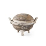 POTTERY JAR AND COVERof globular form, supported on three feet, with upswept handles, the body