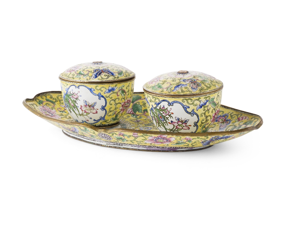 CANTON ENAMEL DESK SETQING DYNASTY, 19TH CENTURYcomprising two bowls and covers and a lobed tray,