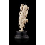 CARVED IVORY FIGURE OF KUI XINGMING DYNASTYthe figure carved with the body turned backwards and