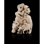 CARVED IVORY FIGURAL GROUPQING DYNASTY, 19TH CENTURYfinely carved as a water buffalo with two