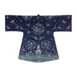 BLUE-GROUND SILK INFORMAL DAY ROBELATE QING DYNASTY, EARLY 20TH CENTURYembroidered with roundels