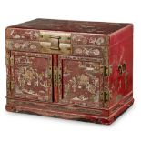 RED LACQUER CABINETQING DYNASTY, 19TH CENTURYthe hinged lid decorated with Buddhist lions and