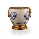 ORMOLU-MOUNTED BLUE AND WHITE CACHE-POTTHE PORCELAIN KANGXI PERIODof bulbous form with moulded