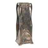 A white metal Art Nouveau bud vase with stylised floral design in the style of Archibald Knox,