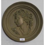 A 19th century gilded plaster circular relief of a lady in Classical pose, 32cm diameter