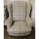 A contemporary John Lewis 'Long Eton Guild Furniture Manufacturers' wing back arm chair with