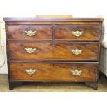 A 19th century mahogany chest of two short and two long graduated drawers with shaped top, profusely