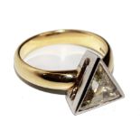 A singular stone triangular trap cut diamond ring of 1.54 carats
