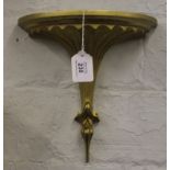 A pair of 19th century parcel gilt wall brackets with scalloped supports