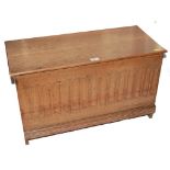 A 19th century beech wood oblong storage trunk or bible box with lift up lid, arcading to the