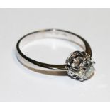 A single stone diamond ring set in 18 carat white gold