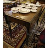 A Victorian mahogany Pembroke table with twin drop leaves, shaped top, one drawer under, raised on