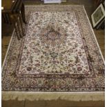 An ivory ground Shahbaz-design drawing room rug, 200cm x 140cm