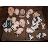 Twenty-two bisque and glazed heads and shoulder-head dolls (22)