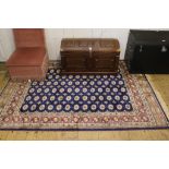 A blue ground Bokhara-design multicoloured floor rug, 240cm x 160cm