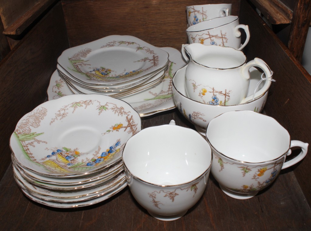 A 'Roslyn' china tea service with floral and foliate depictions