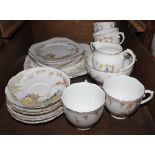 A 'Roslyn' china tea service with floral and foliate depictions