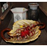 A two handled pottery fruit dish in the shape of a leaf, together with a pottery vase in brown