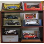 Eight 1/18th and 1/24 scale cars by Franklin Mint, Burago and Maisto, five with original boxes