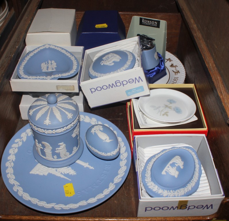 An array of Wedgwood blue and white plates, ornaments, etc