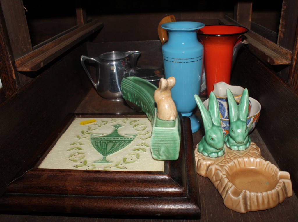 An assortment of mid 20th century household ceramics and metal ware, to include jugs, tea pots,