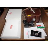 A Leica Mini Elma 13535 camera in box with accessories