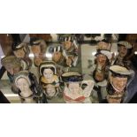 An assortment of Royal Doulton Toby jugs, to include Henry VIII and some of his wives (12)