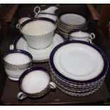 An Osborne china tea service, nine cups, nine saucers, nine side plates, sugar bowl, jug and two