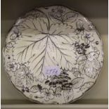 A set of eight Wedgwood dessert plates, ivory ground with silver rims with raised floral and foliate