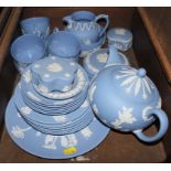 An assortment of Wedgwood plates, saucers, cups, jugs, teapot in blue and white, etc