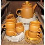 A Langley tea service with cups, saucers, plates, teapots, jug, sugar bowl