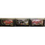 Five Burago 1/18 scale sports cars in original boxes