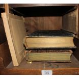 Two early 20th century leather bound photo albums with old photographs, together with a German album