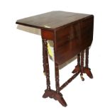 A Victorian mahogany Sutherland table with twin drop leaves, gate leg action, raised on turned legs,