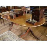 *A Regency-style mahogany and cross banded 'D' end extending dining table with ebony string inlay