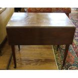 An Edwardian mahogany Pembroke table with twin drop leaves, shaped top, one drawer under with