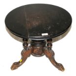 A 19th century oak occasional table with elaborately carved Italianate base with later top, 42H x