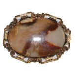 A gold agate mourning brooch