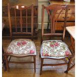 Two Edwardian mahogany occasional chairs with carved and inlaid top rail and splats with fabric